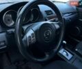 Черный Мазда 3, объемом двигателя 1.6 л и пробегом 146 тыс. км за 5950 $, фото 11 на Automoto.ua