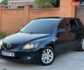 Черный Мазда 3, объемом двигателя 1.6 л и пробегом 184 тыс. км за 6400 $, фото 1 на Automoto.ua