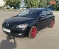 Черный Мазда 3, объемом двигателя 1.6 л и пробегом 247 тыс. км за 5000 $, фото 1 на Automoto.ua