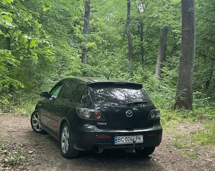Чорний Мазда 3, об'ємом двигуна 2 л та пробігом 180 тис. км за 5888 $, фото 2 на Automoto.ua