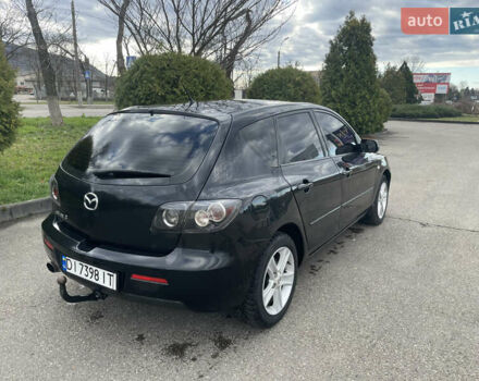 Чорний Мазда 3, об'ємом двигуна 2 л та пробігом 252 тис. км за 4000 $, фото 5 на Automoto.ua