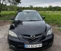 Чорний Мазда 3, об'ємом двигуна 2 л та пробігом 310 тис. км за 4300 $, фото 1 на Automoto.ua