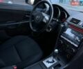 Черный Мазда 3, объемом двигателя 1.6 л и пробегом 146 тыс. км за 5950 $, фото 10 на Automoto.ua