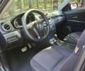 Черный Мазда 3, объемом двигателя 1.6 л и пробегом 200 тыс. км за 5700 $, фото 1 на Automoto.ua