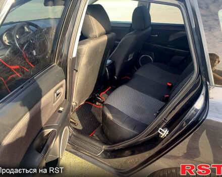 Черный Мазда 3, объемом двигателя 1.6 л и пробегом 247 тыс. км за 5000 $, фото 7 на Automoto.ua