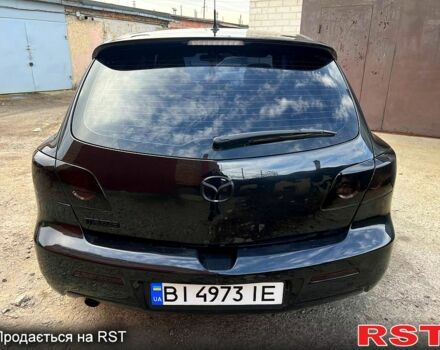 Черный Мазда 3, объемом двигателя 1.6 л и пробегом 333 тыс. км за 4600 $, фото 3 на Automoto.ua