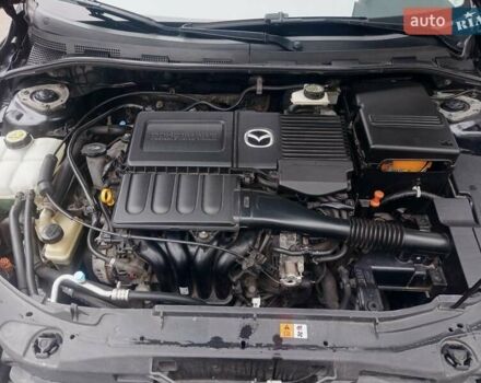 Черный Мазда 3, объемом двигателя 1.6 л и пробегом 165 тыс. км за 6100 $, фото 30 на Automoto.ua