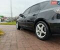Чорний Мазда 3, об'ємом двигуна 1.6 л та пробігом 328 тис. км за 5200 $, фото 5 на Automoto.ua