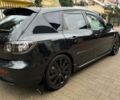 Черный Мазда 3, объемом двигателя 2.2 л и пробегом 210 тыс. км за 24 $, фото 2 на Automoto.ua