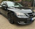 Черный Мазда 3, объемом двигателя 2.2 л и пробегом 210 тыс. км за 24 $, фото 1 на Automoto.ua