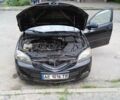 Чорний Мазда 3, об'ємом двигуна 2 л та пробігом 140 тис. км за 7000 $, фото 5 на Automoto.ua