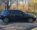Черный Мазда 3, объемом двигателя 1.56 л и пробегом 233 тыс. км за 5200 $, фото 1 на Automoto.ua