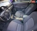 Черный Мазда 3, объемом двигателя 1.6 л и пробегом 330 тыс. км за 4499 $, фото 22 на Automoto.ua
