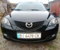 Черный Мазда 3, объемом двигателя 1.6 л и пробегом 246 тыс. км за 5500 $, фото 1 на Automoto.ua
