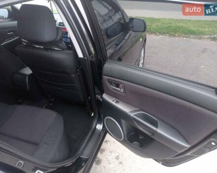 Черный Мазда 3, объемом двигателя 1.6 л и пробегом 165 тыс. км за 6100 $, фото 13 на Automoto.ua