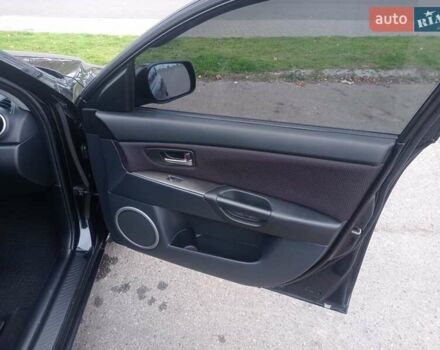 Черный Мазда 3, объемом двигателя 1.6 л и пробегом 165 тыс. км за 6100 $, фото 12 на Automoto.ua