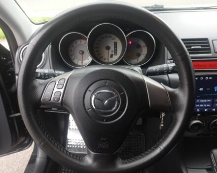 Чорний Мазда 3, об'ємом двигуна 1.6 л та пробігом 165 тис. км за 6100 $, фото 4 на Automoto.ua