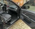 Черный Мазда 3, объемом двигателя 2 л и пробегом 254 тыс. км за 4500 $, фото 5 на Automoto.ua