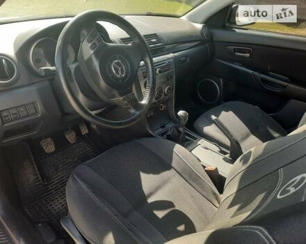 Черный Мазда 3, объемом двигателя 2 л и пробегом 222 тыс. км за 5700 $, фото 9 на Automoto.ua