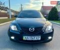 Черный Мазда 3, объемом двигателя 1.6 л и пробегом 170 тыс. км за 6950 $, фото 1 на Automoto.ua