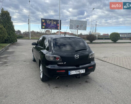 Чорний Мазда 3, об'ємом двигуна 2 л та пробігом 252 тис. км за 4000 $, фото 2 на Automoto.ua