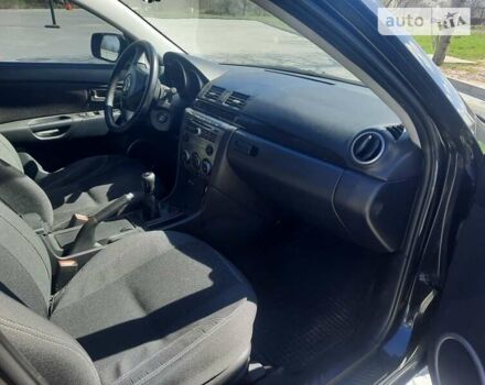 Черный Мазда 3, объемом двигателя 2 л и пробегом 222 тыс. км за 5700 $, фото 12 на Automoto.ua