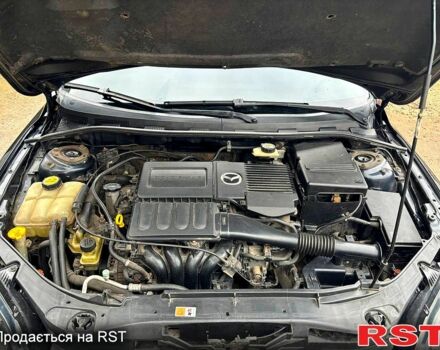 Черный Мазда 3, объемом двигателя 1.6 л и пробегом 333 тыс. км за 4600 $, фото 12 на Automoto.ua