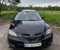 Чорний Мазда 3, об'ємом двигуна 2 л та пробігом 310 тис. км за 4304 $, фото 2 на Automoto.ua