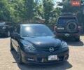 Черный Мазда 3, объемом двигателя 2.3 л и пробегом 150 тыс. км за 15000 $, фото 1 на Automoto.ua