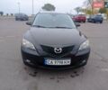 Черный Мазда 3, объемом двигателя 1.6 л и пробегом 165 тыс. км за 6100 $, фото 1 на Automoto.ua