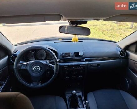 Черный Мазда 3, объемом двигателя 2 л и пробегом 198 тыс. км за 6200 $, фото 4 на Automoto.ua