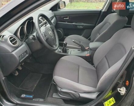 Черный Мазда 3, объемом двигателя 1.6 л и пробегом 264 тыс. км за 5700 $, фото 12 на Automoto.ua