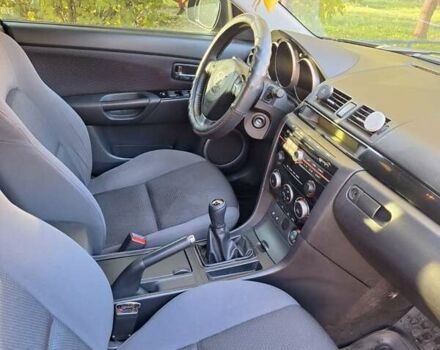 Черный Мазда 3, объемом двигателя 2 л и пробегом 198 тыс. км за 6200 $, фото 1 на Automoto.ua