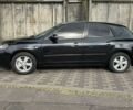 Черный Мазда 3, объемом двигателя 1.6 л и пробегом 215 тыс. км за 5850 $, фото 1 на Automoto.ua