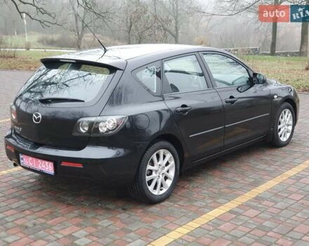 Черный Мазда 3, объемом двигателя 1.6 л и пробегом 264 тыс. км за 5700 $, фото 4 на Automoto.ua