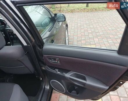 Черный Мазда 3, объемом двигателя 1.6 л и пробегом 264 тыс. км за 5700 $, фото 17 на Automoto.ua