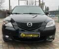 Черный Мазда 3, объемом двигателя 1.6 л и пробегом 265 тыс. км за 5800 $, фото 1 на Automoto.ua