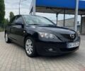Черный Мазда 3, объемом двигателя 1.6 л и пробегом 180 тыс. км за 6198 $, фото 1 на Automoto.ua
