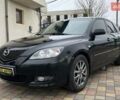 Черный Мазда 3, объемом двигателя 1.6 л и пробегом 265 тыс. км за 5999 $, фото 2 на Automoto.ua