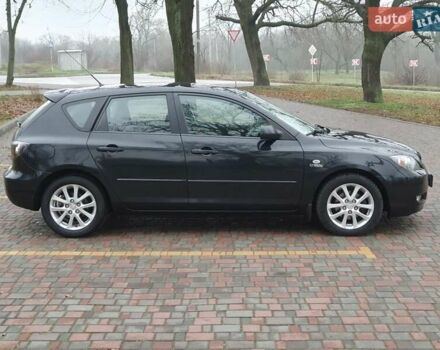 Черный Мазда 3, объемом двигателя 1.6 л и пробегом 264 тыс. км за 5700 $, фото 3 на Automoto.ua