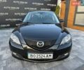 Черный Мазда 3, объемом двигателя 1.6 л и пробегом 120 тыс. км за 6750 $, фото 1 на Automoto.ua