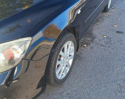 Черный Мазда 3, объемом двигателя 2 л и пробегом 198 тыс. км за 6200 $, фото 20 на Automoto.ua