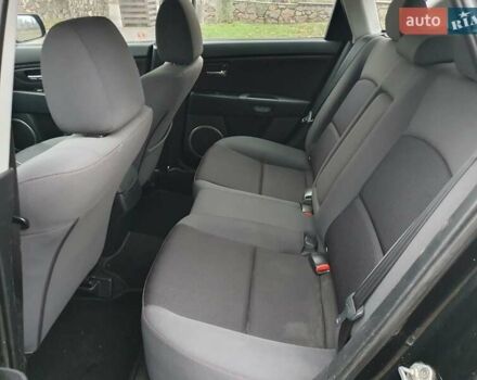 Черный Мазда 3, объемом двигателя 1.6 л и пробегом 264 тыс. км за 5700 $, фото 14 на Automoto.ua