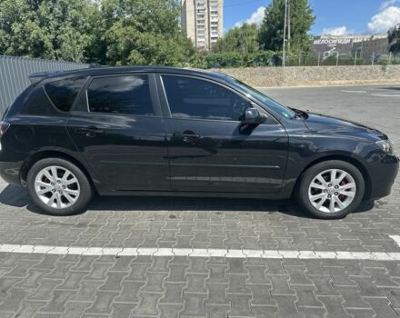 Черный Мазда 3, объемом двигателя 1.6 л и пробегом 205 тыс. км за 6499 $, фото 1 на Automoto.ua