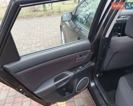 Черный Мазда 3, объемом двигателя 1.6 л и пробегом 264 тыс. км за 5700 $, фото 15 на Automoto.ua