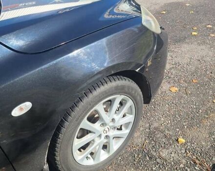 Черный Мазда 3, объемом двигателя 2 л и пробегом 198 тыс. км за 6200 $, фото 18 на Automoto.ua