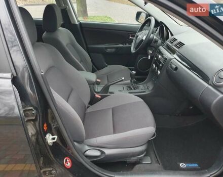 Черный Мазда 3, объемом двигателя 1.6 л и пробегом 264 тыс. км за 5700 $, фото 18 на Automoto.ua