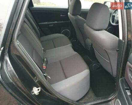 Черный Мазда 3, объемом двигателя 1.6 л и пробегом 264 тыс. км за 5700 $, фото 16 на Automoto.ua