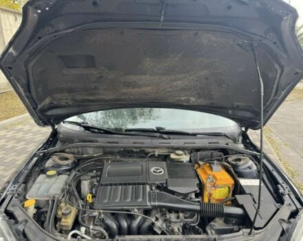 Черный Мазда 3, объемом двигателя 1.6 л и пробегом 215 тыс. км за 5850 $, фото 8 на Automoto.ua