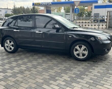 Черный Мазда 3, объемом двигателя 1.6 л и пробегом 215 тыс. км за 5850 $, фото 1 на Automoto.ua